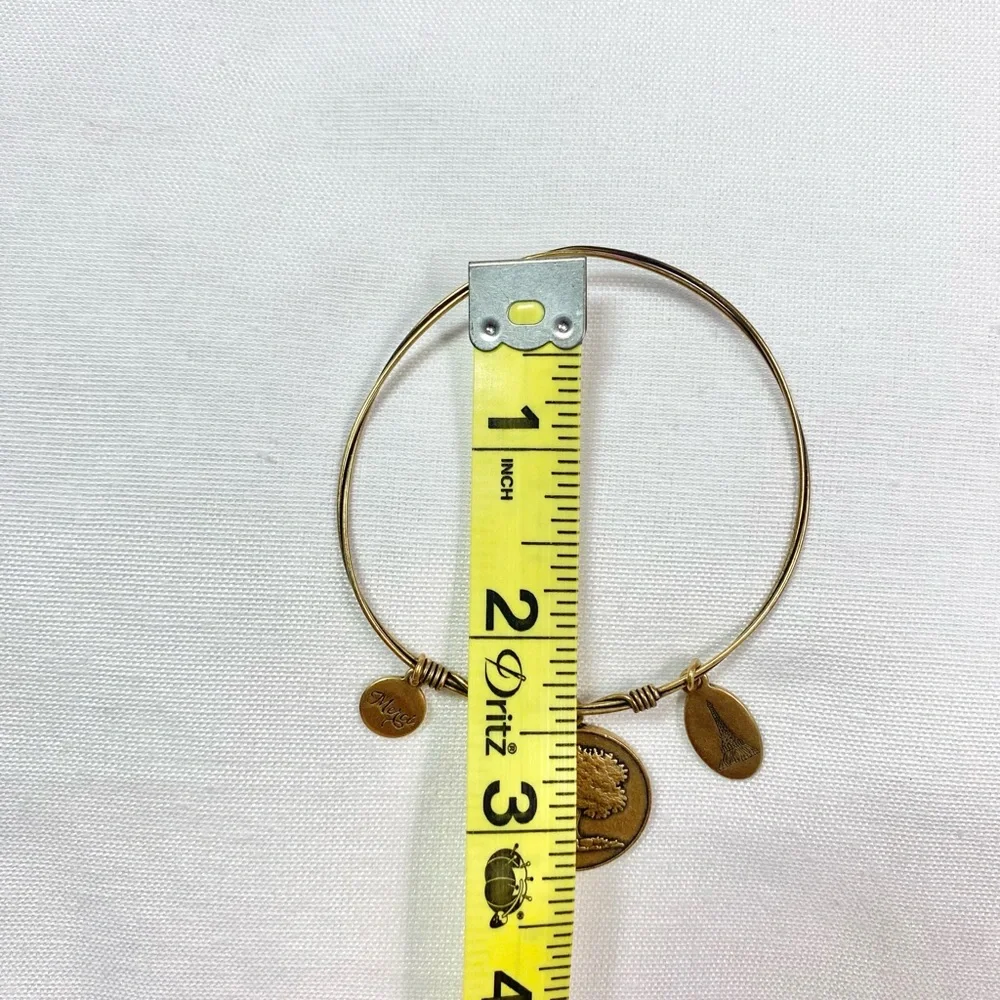 Gold tone bracelet family tree, “merci”, Eiffle tower charm